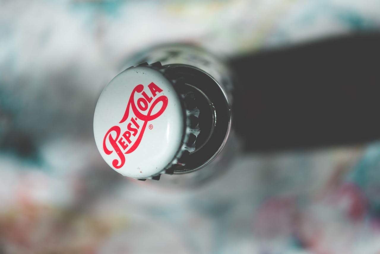 Home Close-up top view of an open Pepsi Cola glass bottle showcasing its iconic branding.